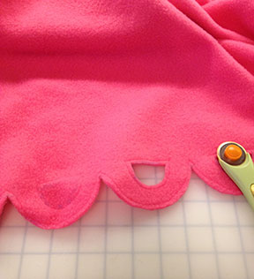 Cutting the capelet scallops Cutting the capelet scallops